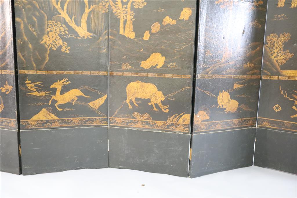 A 19th century Chinese gilt black six fold screen, each panel 45cm, 237cm high